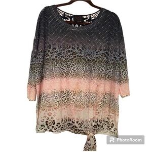 French Blue top,size 1X. Multi colored, Tie on the hem.Lace detailing on back.